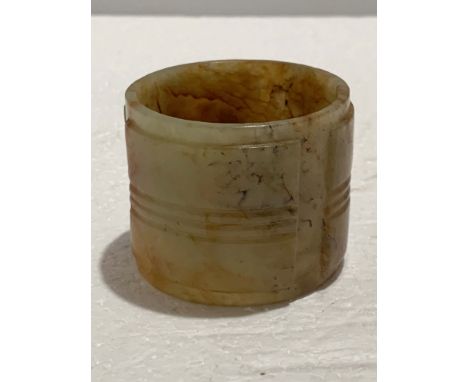 A Chinese Archaistic Jade Cong, H. 4.7 cm, D. 5.7 cm Provenance: Estate of the Lam's family from Hong Kong
