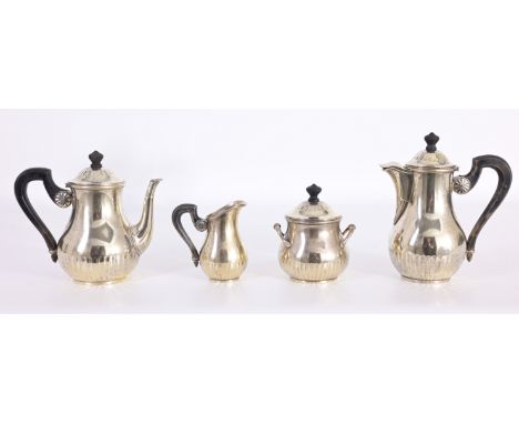 Cartier "Puiforcat" 4-Pc Tea Set. Hallmarked on base. Having ebony handles and spindles on the lids. (L-R) Dimensions: 5.25 x