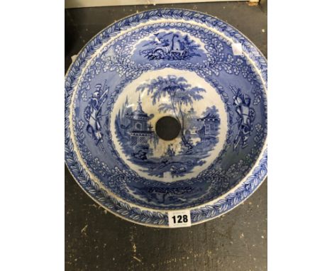 A MAJOLICA LIGHT SHADE TOGETHER WITH A BLUE AND WHITE PRINTED POTTERY WASH BASIN