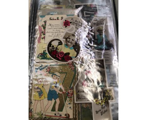 AN ALBUM OF VINTAGE GREETINGS CARDS ETC. 
