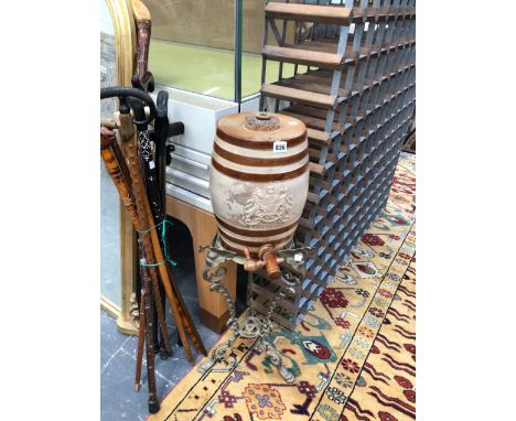 TEN VARIOUS WALKING STICKS TO INCLUDE ANTIQUE AND VINTAGE EXAMPLES TOGETHER WITH A DOULTON AND CO COGNAC BARREL ON A BRASS ST