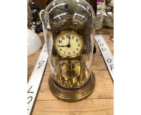 A TIMEPIECE IN ROUND ARCHED MARQUETRIED MAHOGANY CASE TOGETHER WITH A ROTARY CLOCK UNDER DOME