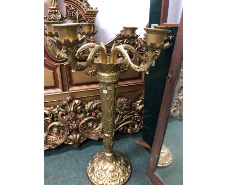 A GOLD DECORATED CAST IRON CANDELABRA OF LARGE PROPORTIONS. 