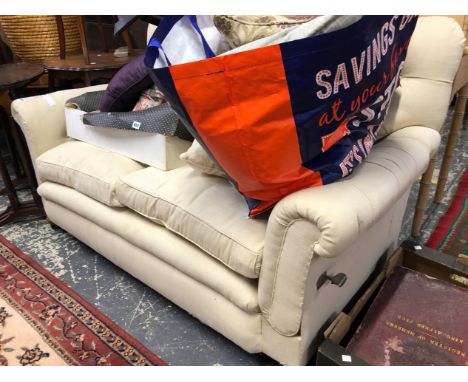 AN EDWARDIAN BUTTON BACK DROP END TW SEAT SETTEE. 