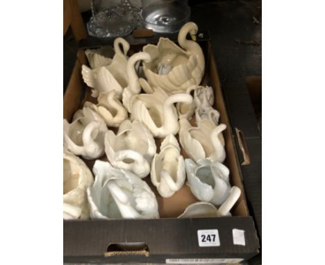 A COLLECTION OF SWANS AND OTHER CERAMIC BIRDS