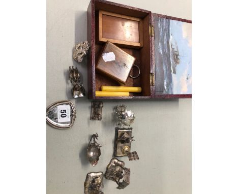 A COLLECTION OF MINIATURE SILVER ANTIQUE ORNAMENTS DEPICTING CHERUBS ETC, TOGETHER WITH A SMALL VINTAGE FIRST AID BOX.