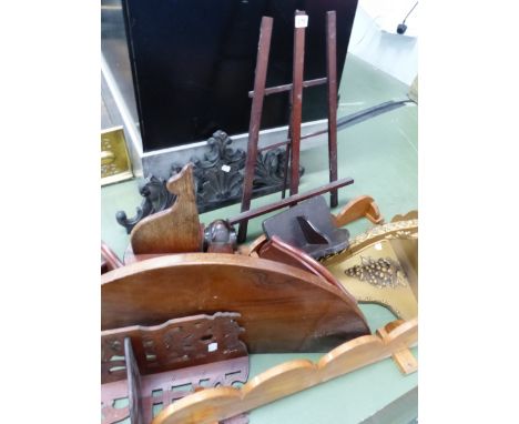 A SELECTION OF WALL BRACKET IN VARIOUS WOODS TOGETHER WITH AN EASEL