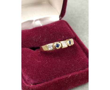 A HALLMARKED 9ct GOLD GOLD CUBIC ZIRCONIA HALF ETERNITY RING. FINGER SIZE M. WEIGHT 4.7grms. 