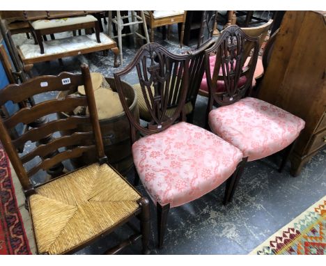 A PAIR OF ANTIQUE SHIELD BACK CHAIRS AND A LADDER BACK EXAMPLE. 