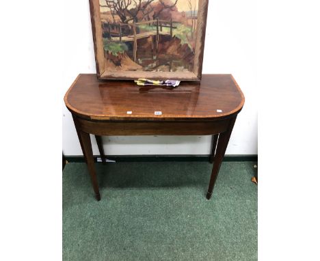 A GEORGE III MAHOGANY FOLD OVER CARD TABLE. 