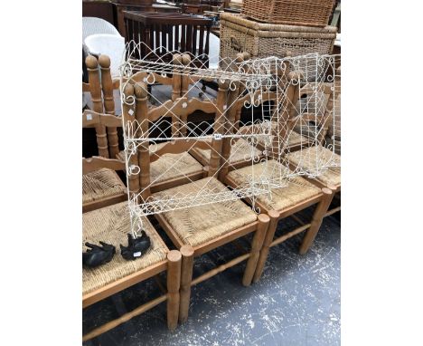 A SET OF EIGHT RUSH SEAT LADDER BACK CHAIRS. 