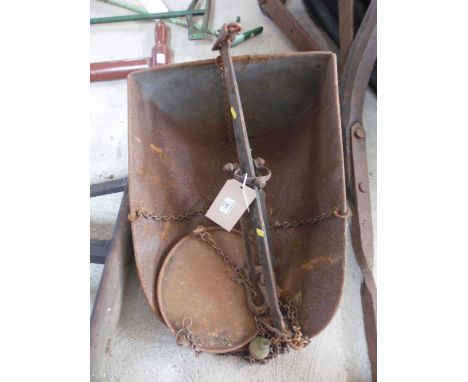 A set of large balance scales, complete