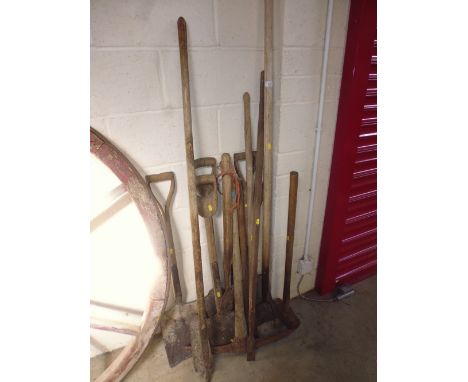 A quantity of long handled tools
