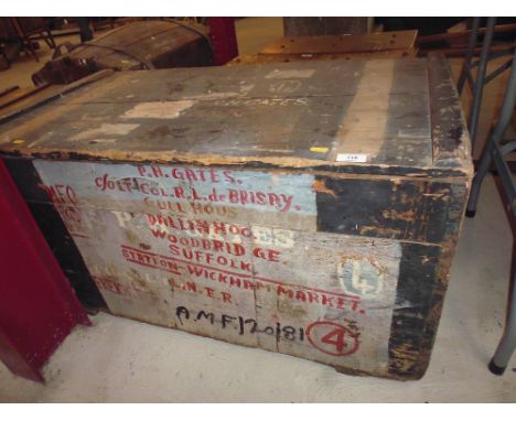 An old metal lined pine travelling trunk with handles 