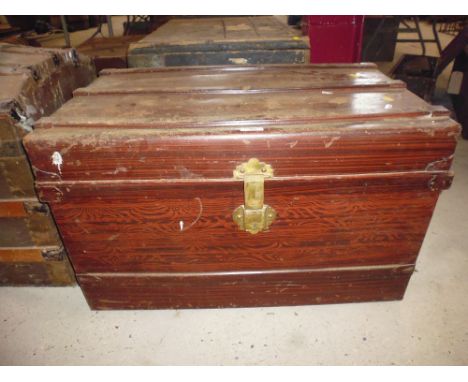 A metal bound metal trunk