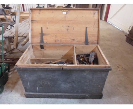 A large cabinet makers tool chest; and a quantity of wood working tools and planes 