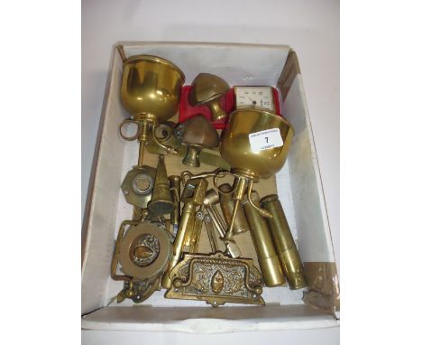 A box of various brass items to include door knocker etc. 