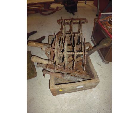 A wooden trug and quantity of old tools