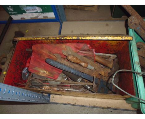 A plastic crate, a plastic pail, and tool box, all containing tools 