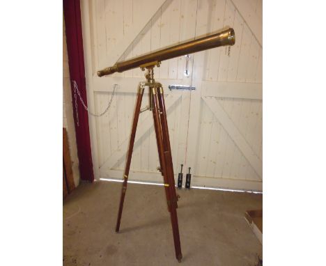 A brass telescope on stand
