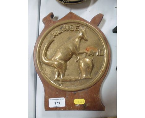 A brass kangaroo motif plaque 