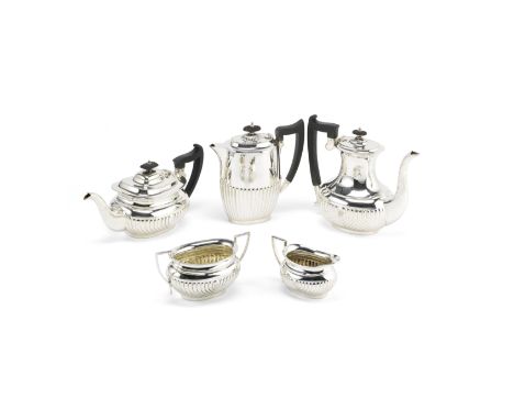 A silver four-piece tea and coffee service, with a matched hot water potE Viners, Sheffield 1919, hot water pot 1928The servi