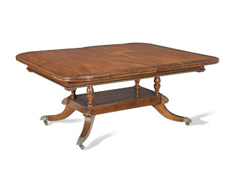 An Irish Regency mahogany and rosewood banded extending dining tablepossibly by Mack, Williams and Gibton1820-1825, the round