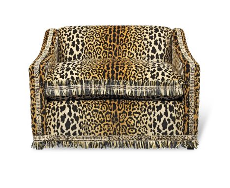 An 'Egerton love seat' or marquise designed by OKA and upholstered by Lucy BarlowWith leopard print upholstery and a raffia t