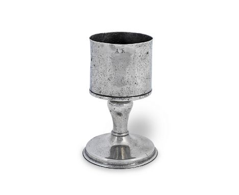 An 18th century pewter chalicepossibly Irish, the straight-sided and flat-bottom bowl with stamped ownership initials A R to 