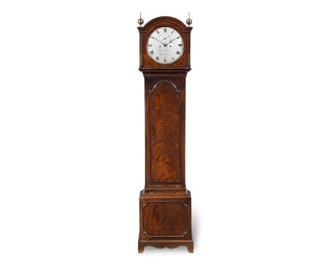 An early 19th century mahogany and boxwood strung longcase clockthe dial signed William Carter, Salisbury the arched hood wit