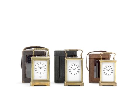 Two early 20th century French brass carriage clocks with push repeats and a further similar period French brass carriage cloc