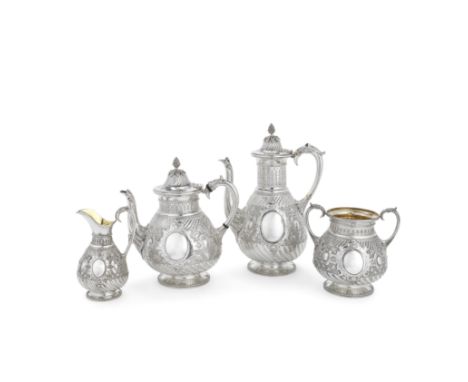 A Victorian silver four-piece tea and coffee serviceMartin Hall &amp; Co, London 1868Pear form part fluted bodies profusely d