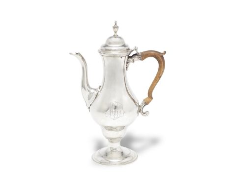 A George III silver coffee potEdward Fernell, London 1782 Baluster form, hinged dome cover and vase finial, engraved crest fo