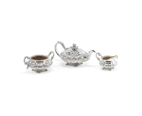 A George IV silver three-piece tea serviceRobert Hennell, London 1826Compressed melon form, with acanthus and floral panels t