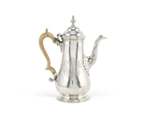 A George III silver coffee potGeorge Methuen, London 1760 Baluster form, the hinged domed cover with bell finial, scroll and 