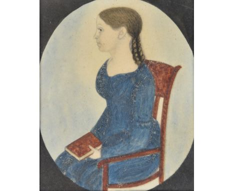 Justus Dalee (American 1793-1878)Portrait of a young girl, seated three-quarter-length, holding a red bookPen, ink and waterc