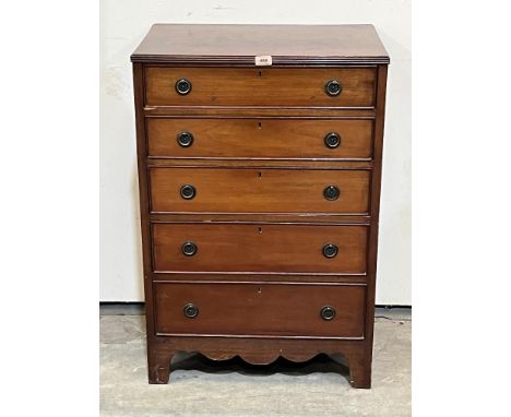 An early 20th century mahogany chest of five long drawers on bracket feet. 24' wide. Back lacking 