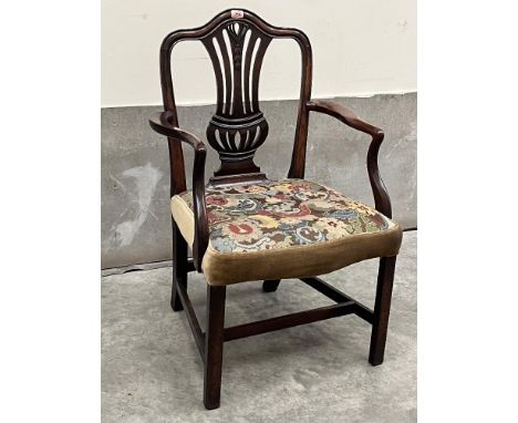 A George III mahogany Hepplewhite style armchair with woolwork tapestry seat on square chamfered legs