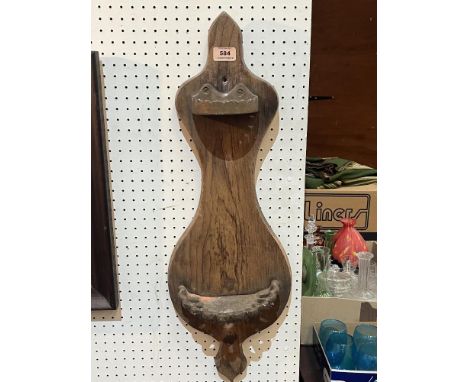 A 19th century pine mural clay pipe rack with pierced gilt iron fittings and shaped back. Possibly a shop display rack. 29' h