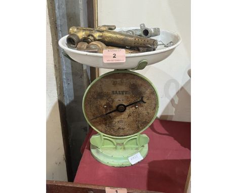 A set of scales and beer taps.