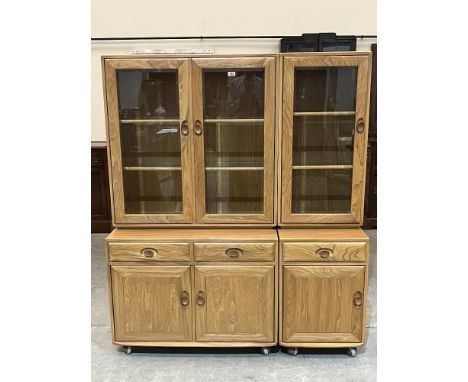 Ercol Furniture. A Windsor elm high sideboard/dresser. 54½'w x 64'h