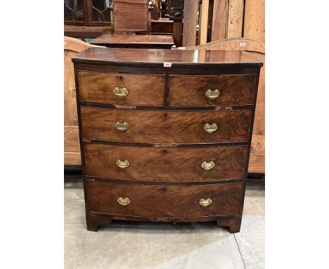 A Victorian mahogany bow fronted chest of drawers on bracket feet. 39½' wide