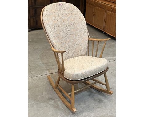 Ercol Furniture. An elm and beechwood rocking chair 