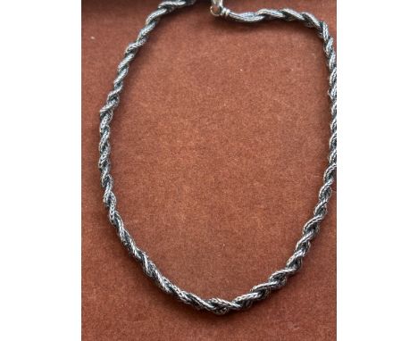 Silver heavy neck chain stamped on clasp 