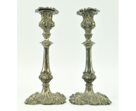 A pair of 19th century Victorian silver plated EPNS candlesticks. Each candlestick featuring heavily scrolled acanthus embell