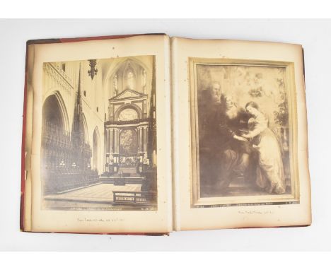 A late 19th century Victorian scrap album, bound in contemporary half morocco. Gilt initials M. L. C. to front board, extremi