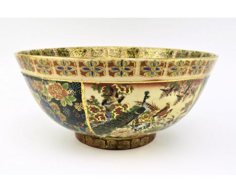 A 20th century Chinese ceramic punch bowl with heavily gilt &amp; enamel decoration in a Satsuma style. The bowl with floral 