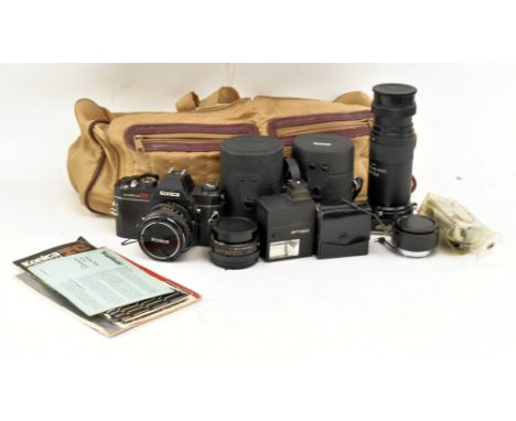 Vintage cameras. A collection of vintage cameras and accessories. The lot to include Konica Autoreflex TC camera, Konica Peak