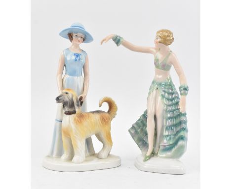 A pair of 20th century Art Deco style porcelain lady figurines. The lot comprising a dancer wearing ruffled green dress, alon