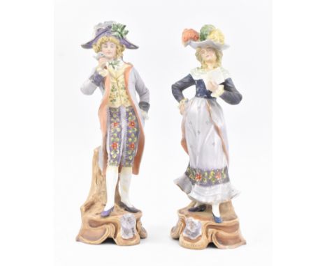 A pair of 20th century Meissen style bisque figurines. Comprising a dandy gentleman figurine with flower, and a lady to match